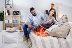 Family Sitting on Couch
