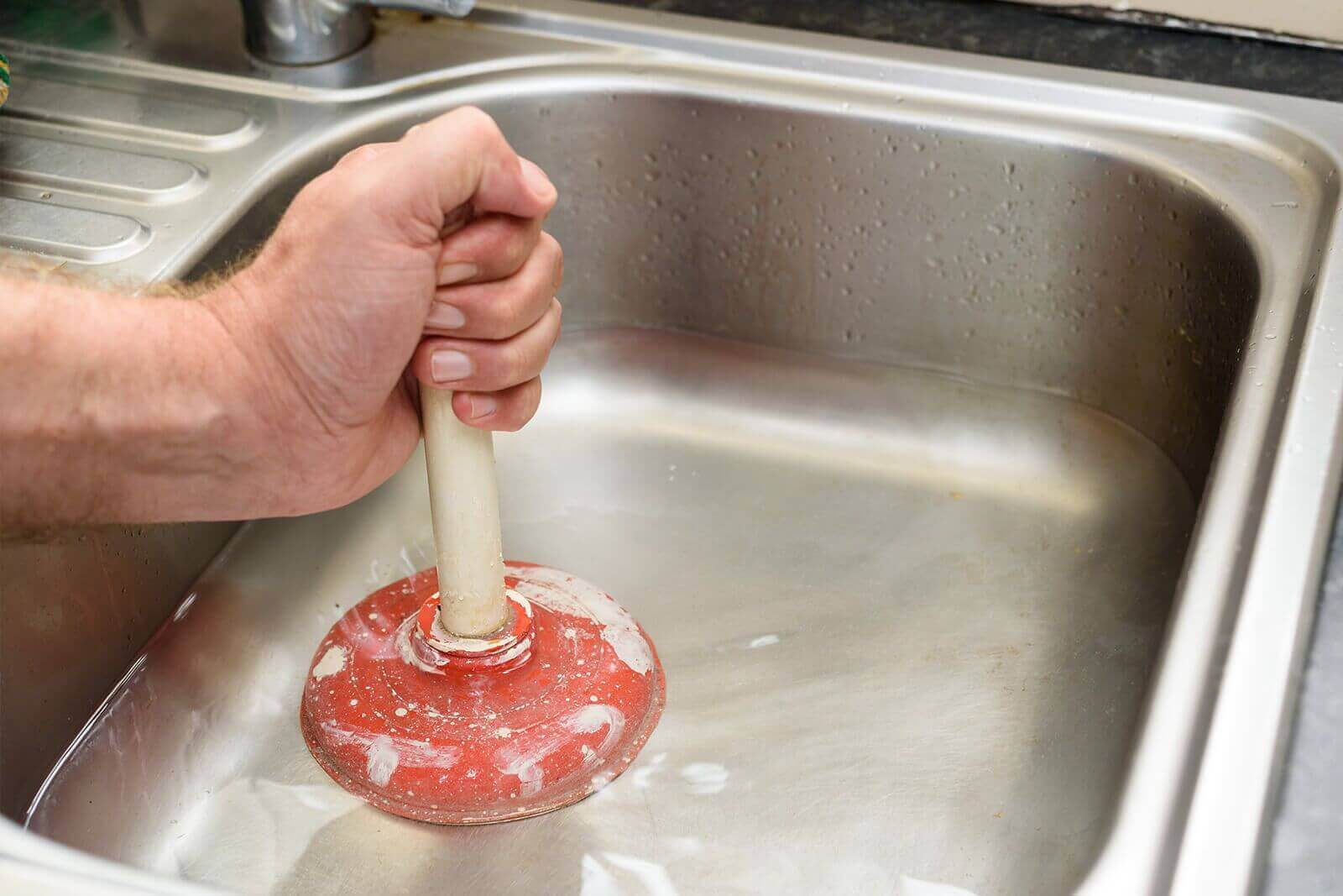 Plunging a kitchen sink