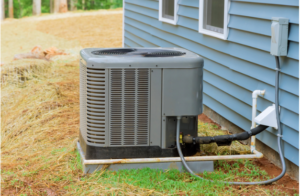 a new air conditioning unit outside of a blue house